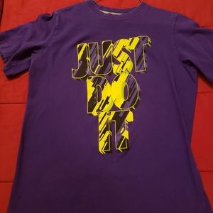 Purple Nike "Just do it" sport t shirt. Excellent condition. Size youth large.
